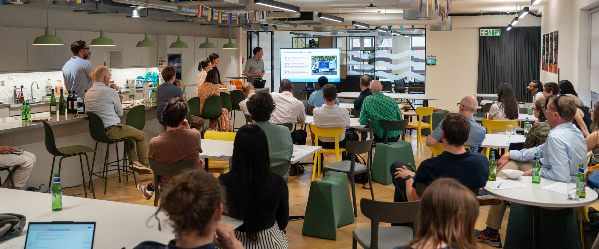 An image of a Lambeth Climate Partnership event, participants networking in the event space.