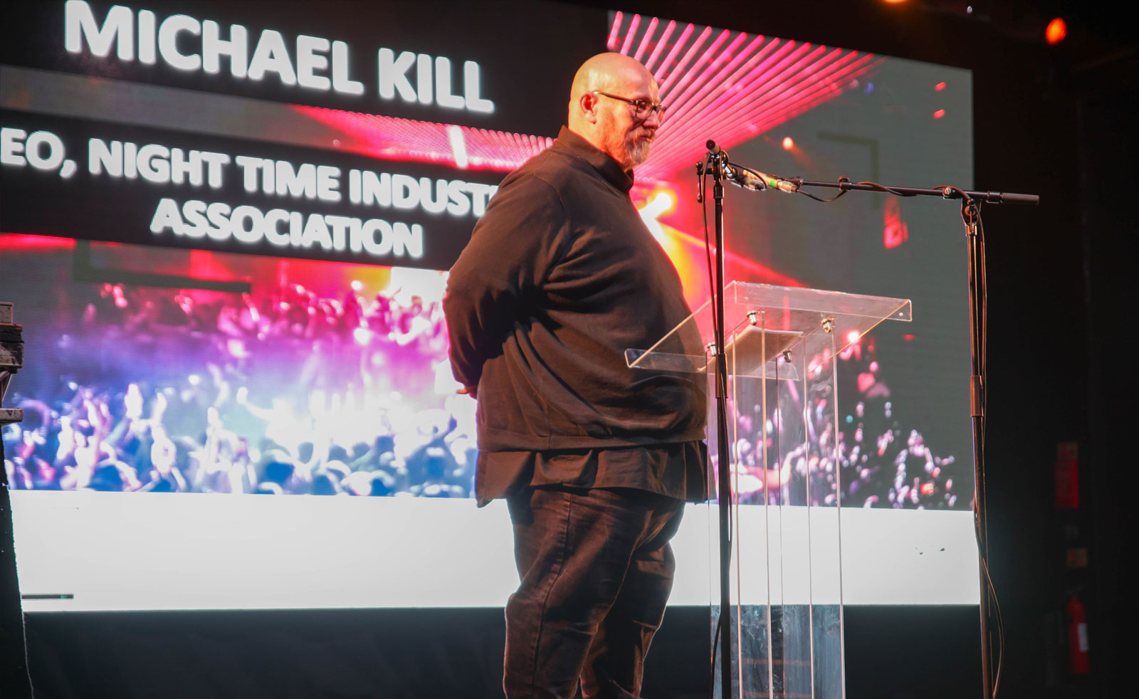 The CEO of the Night Time Industries Association, Mike Kill, speaking into a mic