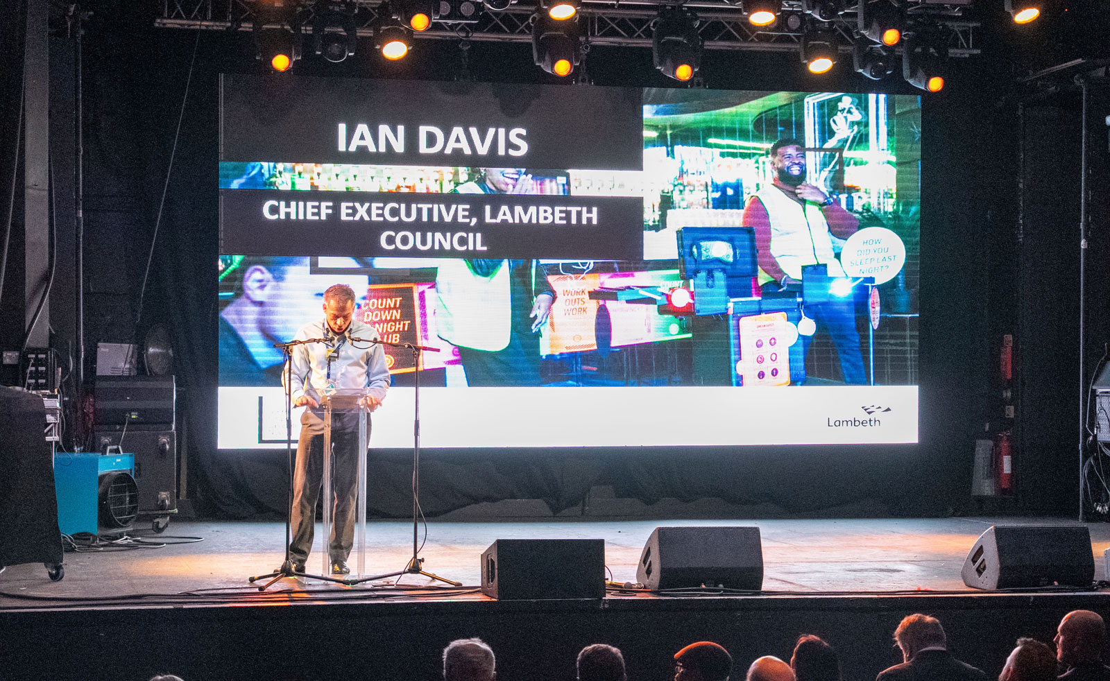Lambeth's CEO, Ian Davis, speaking into a mic at a lectern
