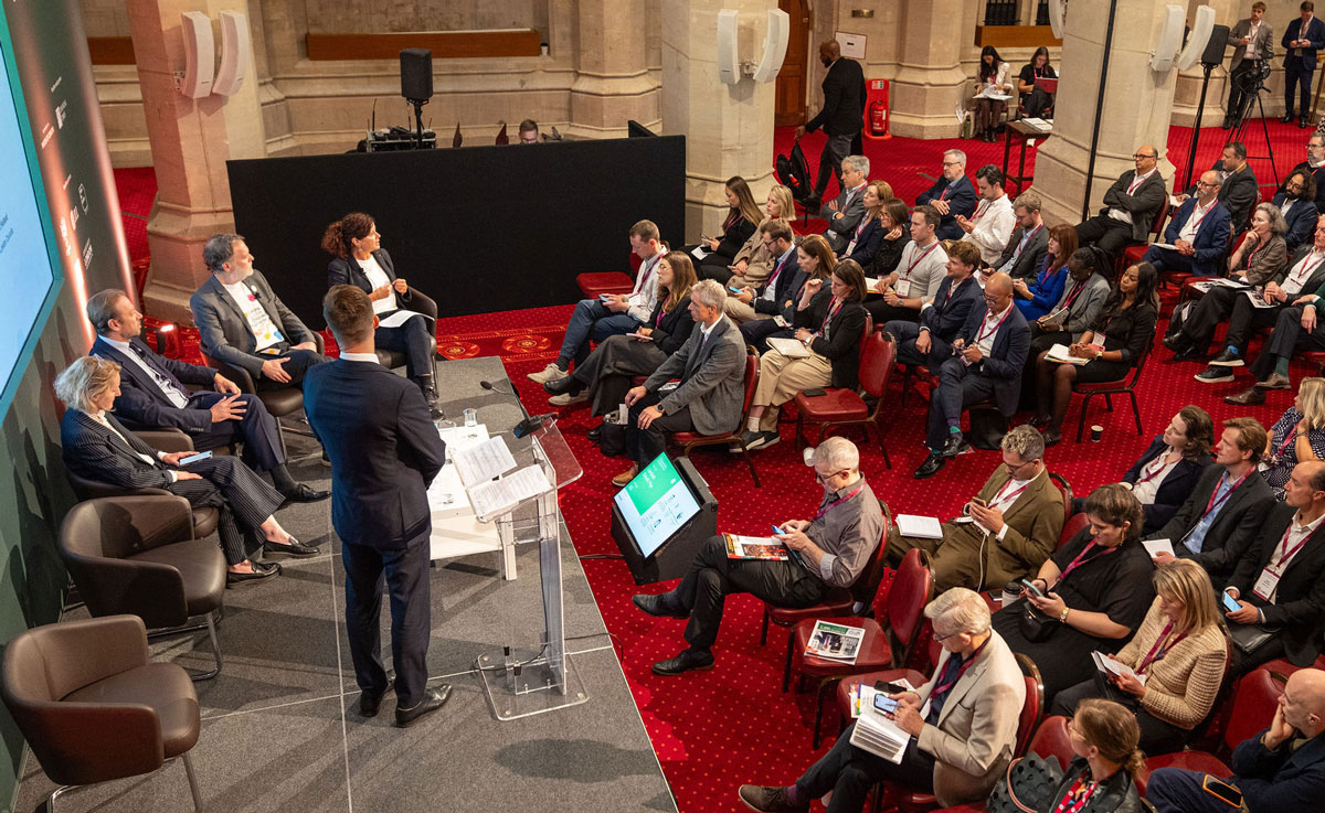 A crowd of people listening to the Lambeth Growth Plan panel session at the London Real Estate forum 2025