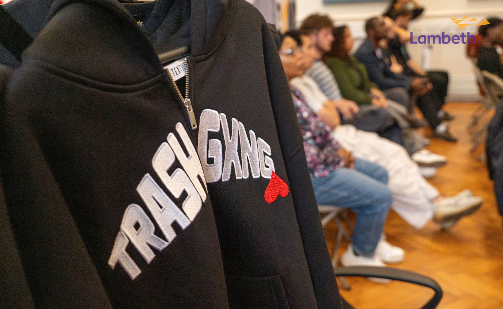A picture of a zip hoodie with Trash Gxng logo