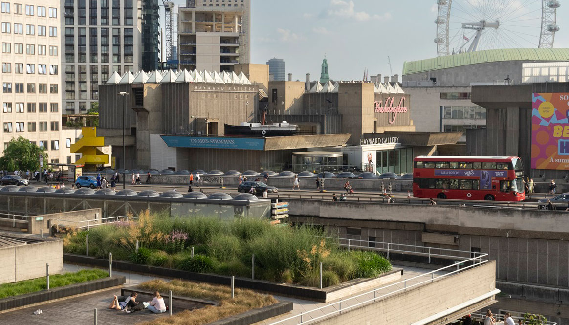 Image of South Bank, looking at the National Theatre and the London Eye in the background